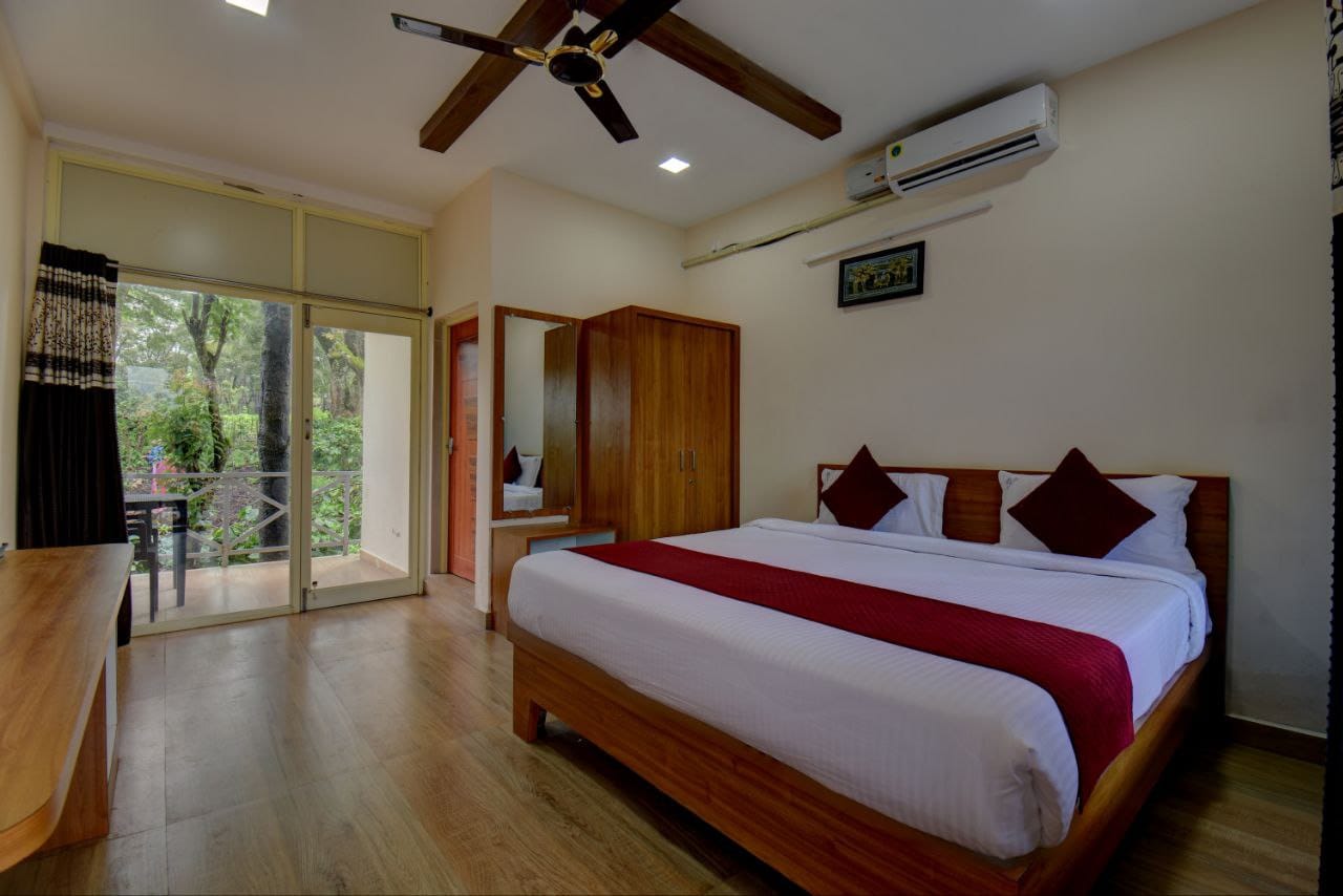 Spacious bedroom suite opening directly to the scenic balcony